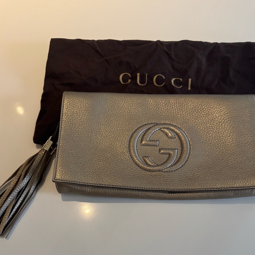 Gucci Gold Leather Clutch